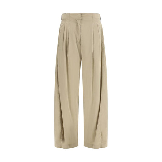 Casual Pants by The Row for women in silk & nylon beige features an sophisticated low rise and regular-fit with a precise long, creating a sophisticated and sophisticated silhouette.