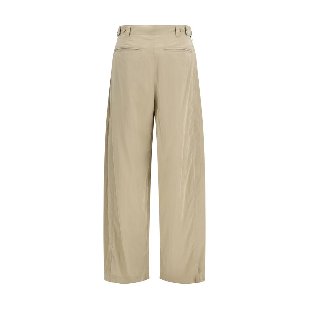 Casual Pants by The Row for women in silk & nylon beige presents a tailored silhouette, showcasing a tailored regular-fit and long cut with a refined low rise for a truly tailored aesthetic.