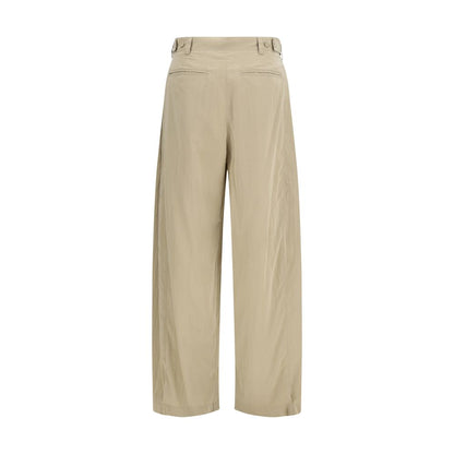 Casual Pants by The Row for women in silk & nylon beige presents a tailored silhouette, showcasing a tailored regular-fit and long cut with a refined low rise for a truly tailored aesthetic.