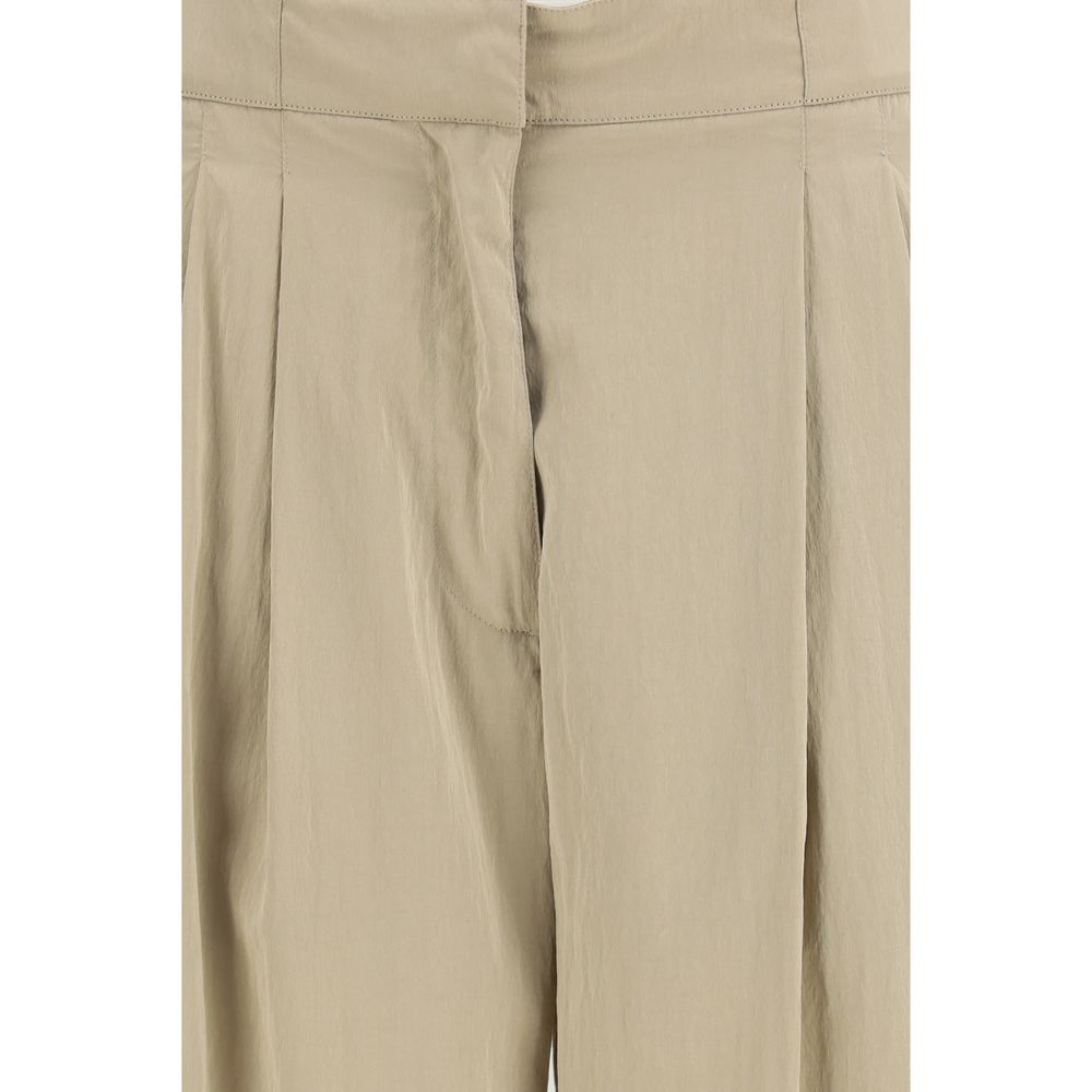 Casual Pants by The Row for women in silk & nylon beige presents a refined pantology silhouette, artfully defined by a refined pantology regular-fit, long, and a sophisticated low rise.