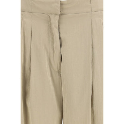 Casual Pants by The Row for women in silk & nylon beige presents a refined pantology silhouette, artfully defined by a refined pantology regular-fit, long, and a sophisticated low rise.