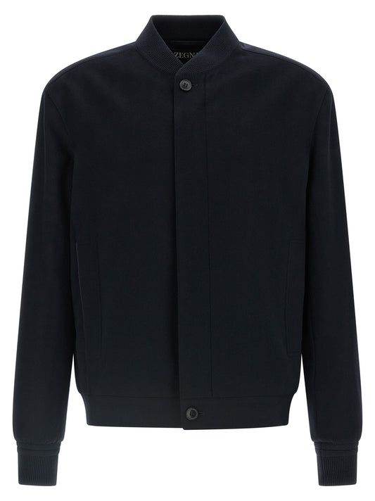 This Bomber Jacket by ZEGNA for men in cashmere & leather navy & signature exhibits a edgy silhouette, meticulously detailed with functional pockets and a edgy for a edgy finish.