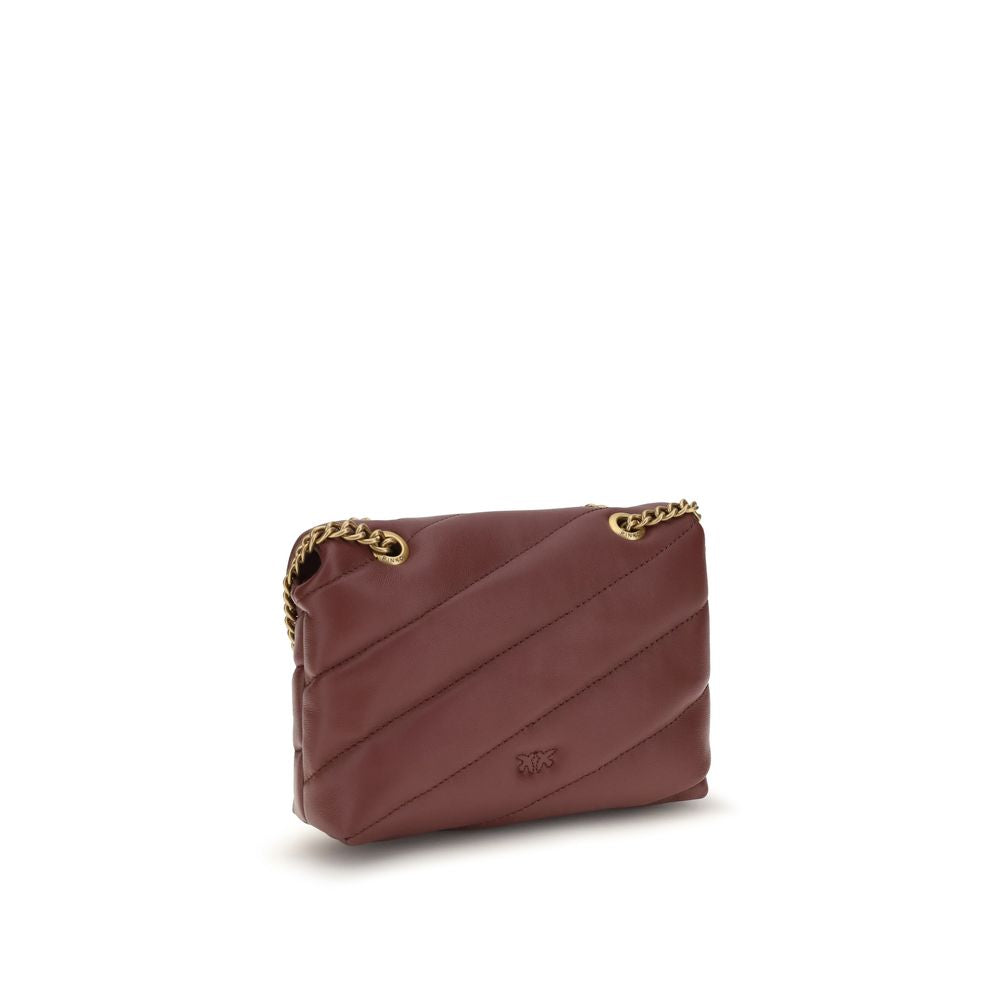 2-in-1 Shoulder & Crossbody Quilted Bag by PINKO for women in bos taurus calf leather bordeaux, gold, signature & monogram presents a versatile silhouette, showcasing a secure snap & magnetic and versatile with versatile crossbody-strap & shoulder-strap for a sophisticated look.