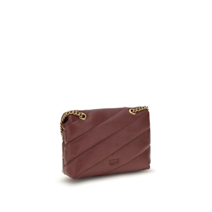2-in-1 Shoulder & Crossbody Quilted Bag by PINKO for women in bos taurus calf leather bordeaux, gold, signature & monogram presents a versatile silhouette, showcasing a secure snap & magnetic and versatile with versatile crossbody-strap & shoulder-strap for a sophisticated look.