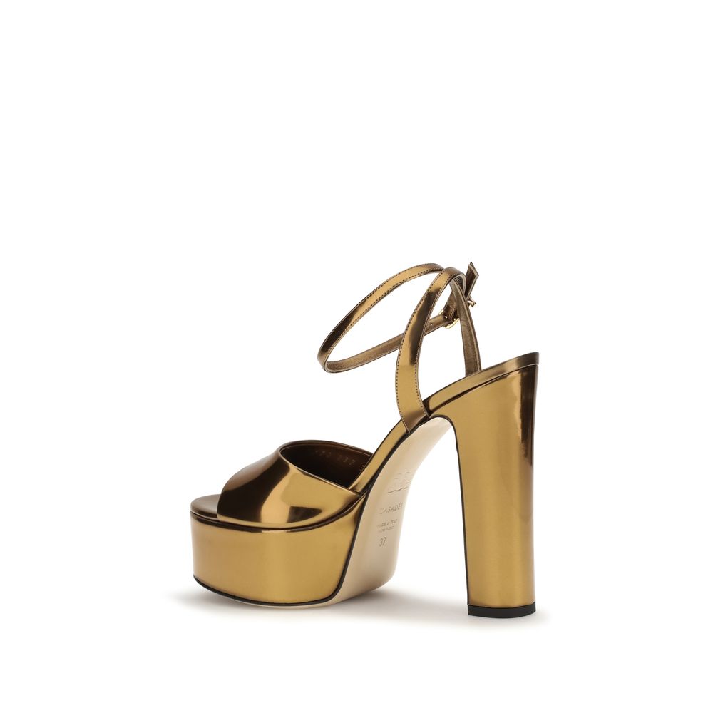 Very-High-Heel Platform Sandals by Casadei for women in polyester & polyurethane gold features an exquisite silhouette, showcasing the exquisite Women's Polyester & Polyurethane Very-High-Heel Platform Sandals with a platform 13-cm-heel very-high-heel and .