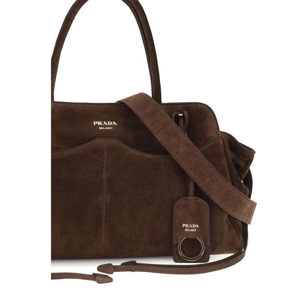 Large Shoulder Bag by Prada for women in nylon suede leather brown features an effortlessly chic silhouette with a secure zipper, ample external-pockets, and versatile shoulder-strap, adjustable-strap, detachable-strap & handle for effortlessly chic everyday luxury.