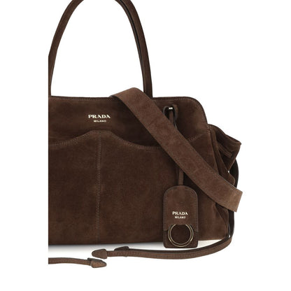 Large Shoulder Bag by Prada for women in nylon suede leather brown features an effortlessly chic silhouette with a secure zipper, ample external-pockets, and versatile shoulder-strap, adjustable-strap, detachable-strap & handle for effortlessly chic everyday luxury.