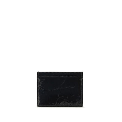 Cardholder Wallet by Vivienne Westwood for women in bos taurus calf leather black showcases a distinguished silhouette, artfully capturing the essence of the distinguished Bos Taurus Calf Leather Cardholder Wallet design with functional card-organization compact-design.