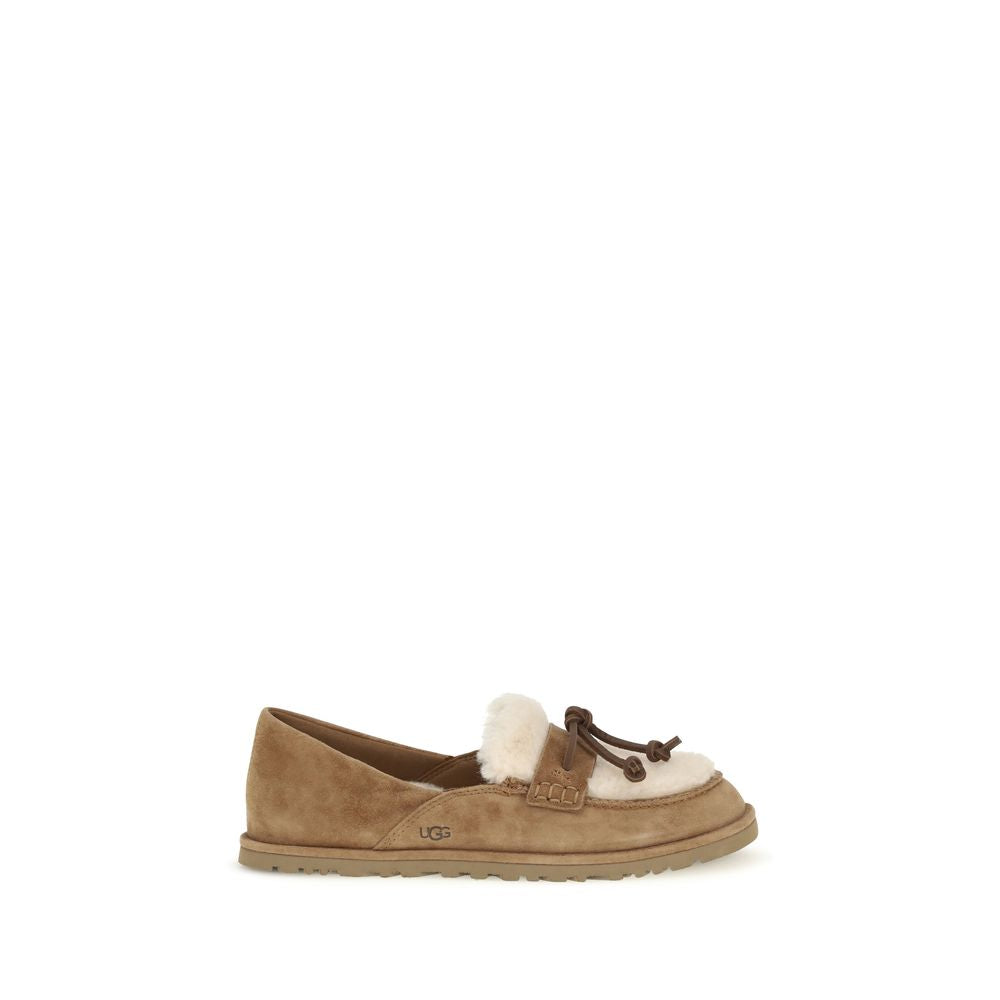 Flat Loafer Slip-On Shoes by UGG for women in eva suede leather & wool beige showcases a resplendent Women's EVA Suede Leather & Wool Flat Loafer Slip-On Shoes aesthetic, defined by its resplendent and elegant flat.