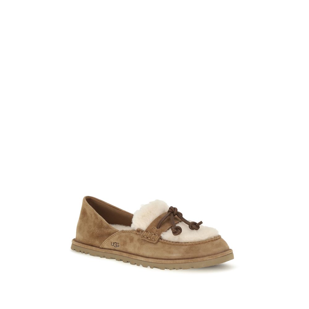 Flat Loafer Slip-On Shoes by UGG for women in eva suede leather & wool beige showcases a impeccable silhouette as Women's EVA Suede Leather & Wool Flat Loafer Slip-On Shoes, artfully designed with a impeccable flat and refined for a impeccable finish.