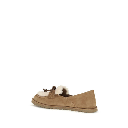 Flat Loafer Slip-On Shoes by UGG for women in eva suede leather & wool beige features an ergonomic silhouette, perfectly showcasing Women's EVA Suede Leather & Wool Flat Loafer Slip-On Shoes with its distinct flat and elegant .