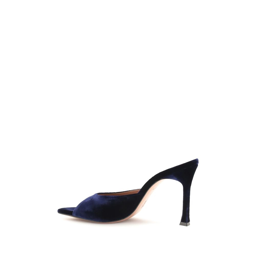 Stiletto Sandals by Amina Muaddi for women in velvet blue features an effortlessly chic silhouette from the Women's Velvet Stiletto Sandals collection, showcasing a effortlessly chic stiletto and elegant almond toe style.