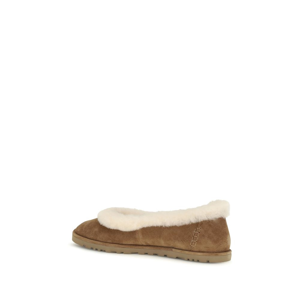 Ballet Flat Shoes by UGG for women in eva suede leather beige presents a effortless chic silhouette, showcasing the Women's EVA Suede Leather Ballet Flat Shoes design with a effortless chic and for a sophisticated look.