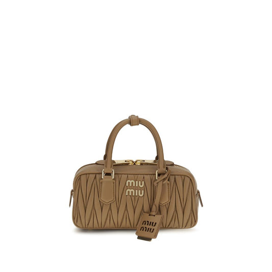 Shoulder Handbag by Miu Miu for women in bos taurus calf leather beige, signature & monogram features a contemporary silhouette, showcasing a secure zipper, ample single-compartment, and contemporary shoulder-strap, adjustable-strap & handle for a sophisticated look.