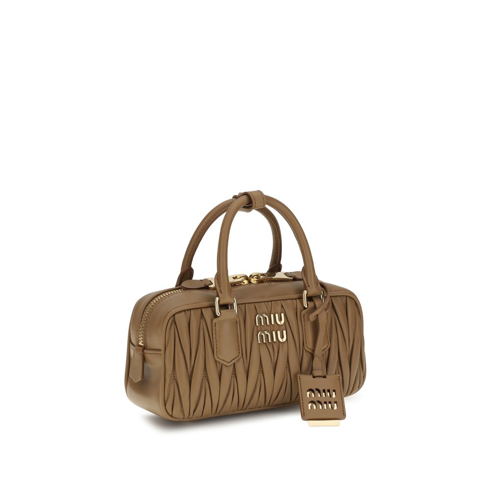 Shoulder Handbag by Miu Miu for women in bos taurus calf leather beige, signature & monogram features a signature silhouette, showcasing a secure zipper and signature single-compartment with versatile shoulder-strap, adjustable-strap & handle for a sophisticated look.