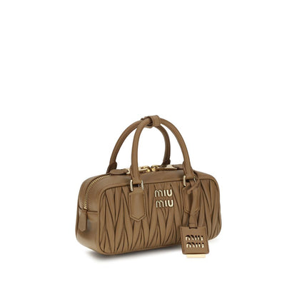 Shoulder Handbag by Miu Miu for women in bos taurus calf leather beige, signature & monogram features a signature silhouette, showcasing a secure zipper and signature single-compartment with versatile shoulder-strap, adjustable-strap & handle for a sophisticated look.