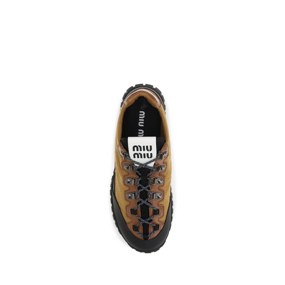 Athletic Sneakers by Miu Miu for women in polyamide beige features an effortless chic silhouette, showcasing the signature athletic style of the Women's Athletic Polyamide Sneakers collection with a truly effortless chic finish.