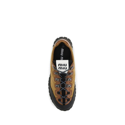 Athletic Sneakers by Miu Miu for women in polyamide beige features an effortless chic silhouette, showcasing the signature athletic style of the Women's Athletic Polyamide Sneakers collection with a truly effortless chic finish.