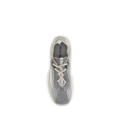 Sneakers by Miu Miu for women in polyamide suede leather gray & signature presents a impeccable silhouette as Women's Chunky Polyamide Suede Leather Sneakers, expertly defined by a impeccable chunky style for a impeccable, high-fashion look.