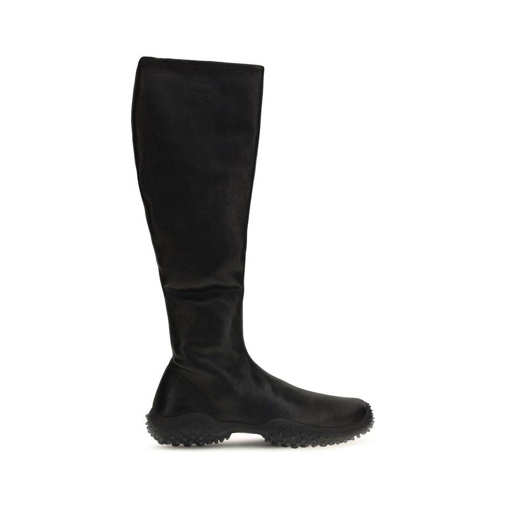 Ankle Boots by Miu Miu for women in nappa leather & rubber black features an dynamic silhouette, showcasing the dynamic Women's Nappa Leather & Rubber Ankle Boots design with its distinctive and elegant .