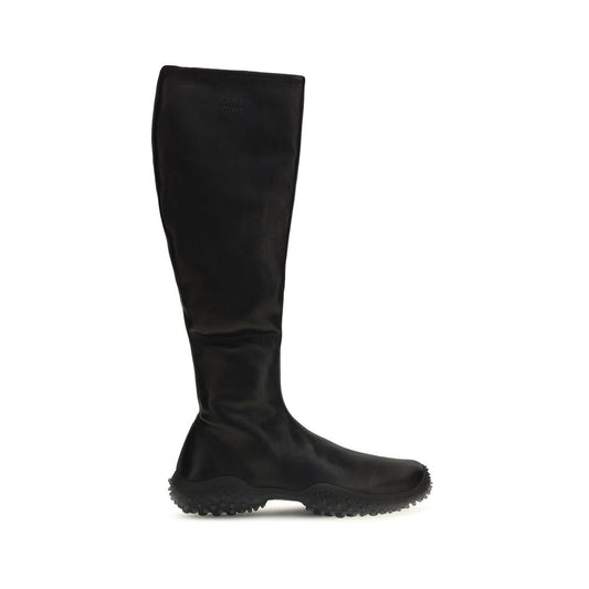 Ankle Boots by Miu Miu for women in nappa leather & rubber black features an dynamic silhouette, showcasing the dynamic Women's Nappa Leather & Rubber Ankle Boots design with its distinctive and elegant .