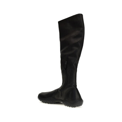 Ankle Boots by Miu Miu for women in nappa leather & rubber black features an enchanting design from the Women's Nappa Leather & Rubber Ankle Boots collection, highlighting a enchanting and for a refined look.
