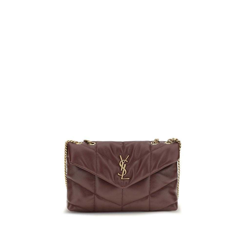 Compact Shoulder Flap Bag by Saint Laurent for women in lambskin leather bordeaux presents a versatile silhouette, showcasing a secure flap & magnetic and versatile with versatile shoulder-strap for a sophisticated look.