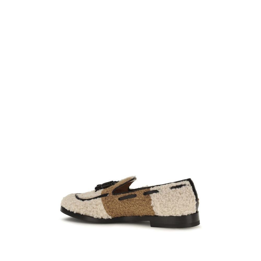 Flat Loafer Slip-On Shoes by Fratelli Rossetti for women in nappa leather beige & striped showcases a impeccable silhouette as Women's Nappa Leather Flat Loafer Slip-On Shoes, artfully designed with a impeccable flat and refined for a impeccable finish.