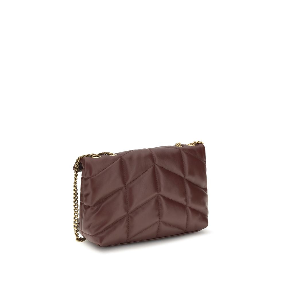 Compact Shoulder Flap Bag by Saint Laurent for women in lambskin leather bordeaux features an effortlessly chic silhouette with a secure flap & magnetic, ample , and versatile shoulder-strap for effortlessly chic everyday luxury.