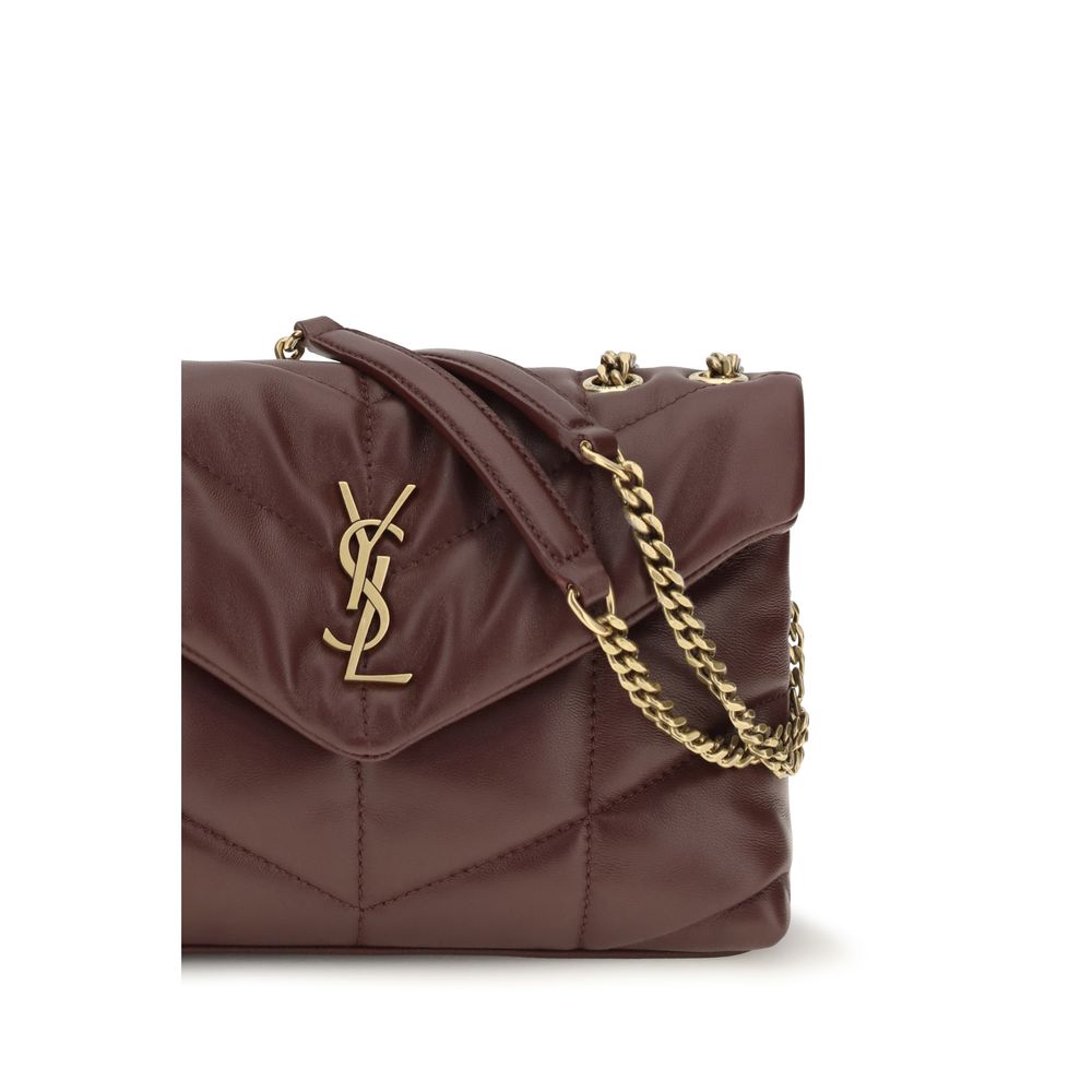 Compact Shoulder Flap Bag by Saint Laurent for women in lambskin leather bordeaux features a distinguished silhouette, showcasing a secure flap & magnetic and distinguished with versatile shoulder-strap for a distinguished finish.