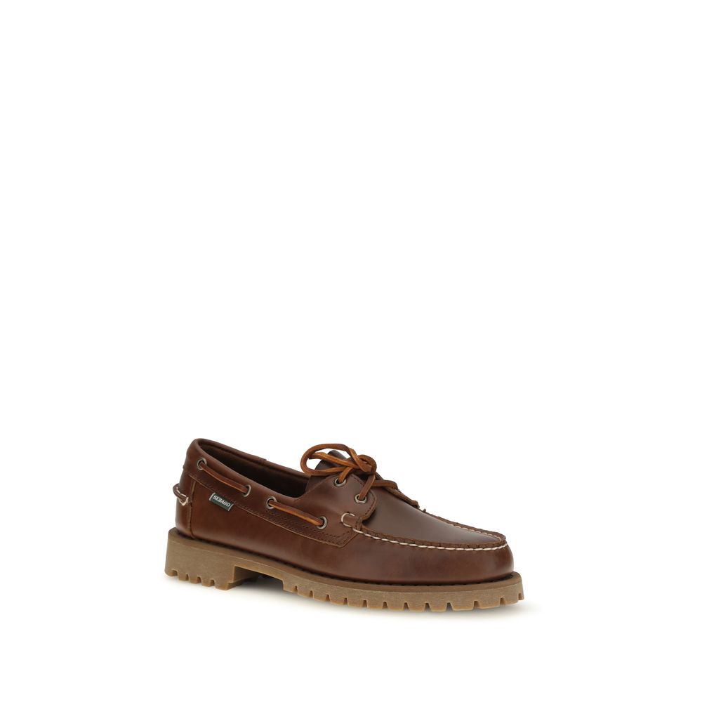 Boat Loafer Slip-On Shoes by Sebago for men in bos taurus calf suede leather brown & honey showcases a impeccable silhouette as Men's Bos Taurus Calf Suede Leather Boat Loafer Slip-On Shoes, artfully designed with a impeccable and refined for a impeccable finish.