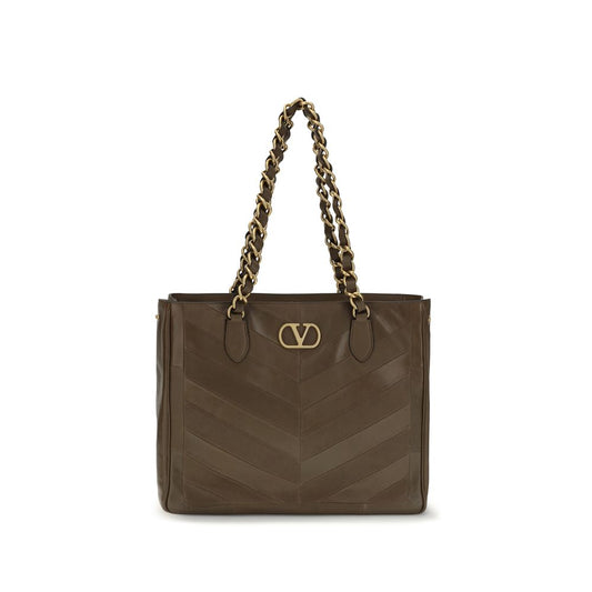 Shoulder Shopper Bag by Valentino Garavani for women in bos taurus nappa calf leather brown, gold, patterned, chevron, signature & patchwork features a enviable silhouette, showcasing a secure magnetic, ample , and enviable shoulder-strap & handle for a enviable finish.
