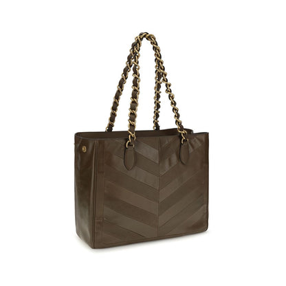 Shoulder Shopper Bag by Valentino Garavani for women in bos taurus nappa calf leather brown, gold, patterned, chevron, signature & patchwork features an effortlessly chic silhouette with a secure magnetic, ample , and versatile shoulder-strap & handle for effortlessly chic everyday luxury.