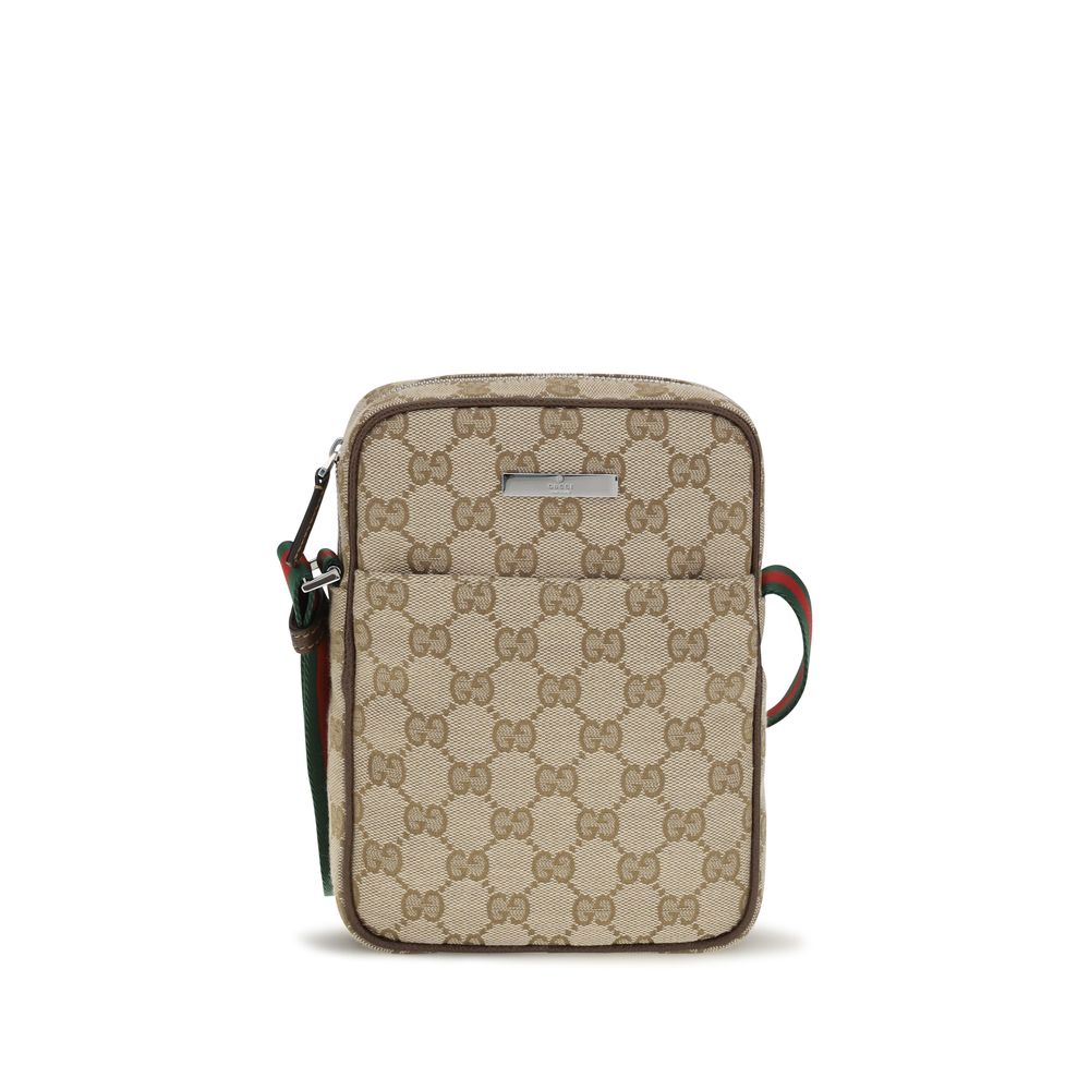 Shoulder Shopper Pouch Bag by Gucci for men in canvas leather & palladium beige, brown, green, palladium, red, signature & striped features a distinguished silhouette, showcasing a secure zipper & magnetic and distinguished with versatile shoulder-strap & adjustable-strap for a distinguished finish.