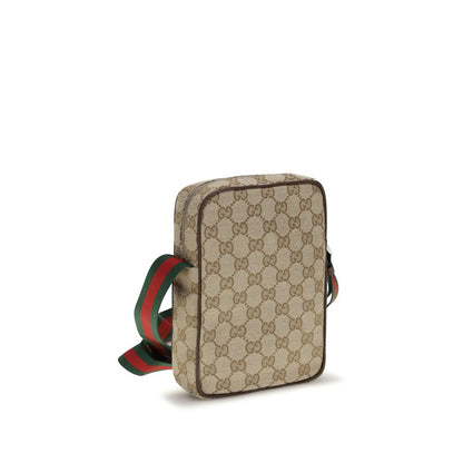 Shoulder Shopper Pouch Bag by Gucci for men in canvas leather & palladium beige, brown, green, palladium, red, signature & striped features a enviable silhouette, showcasing a secure zipper & magnetic, ample , and enviable shoulder-strap & adjustable-strap for a enviable finish.