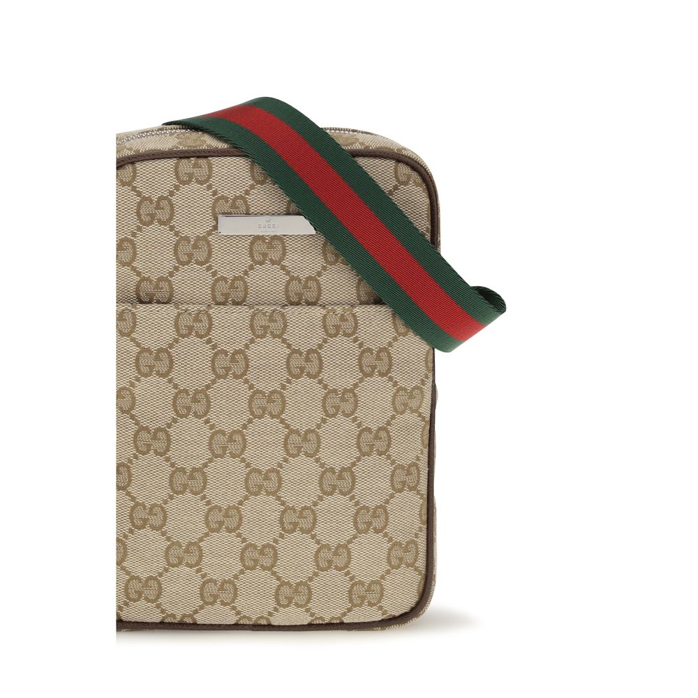 Shoulder Shopper Pouch Bag by Gucci for men in canvas leather & palladium beige, brown, green, palladium, red, signature & striped features a effortless sophistication silhouette, secured by a zipper & magnetic with ample and versatile shoulder-strap & adjustable-strap for a effortless sophistication finish.