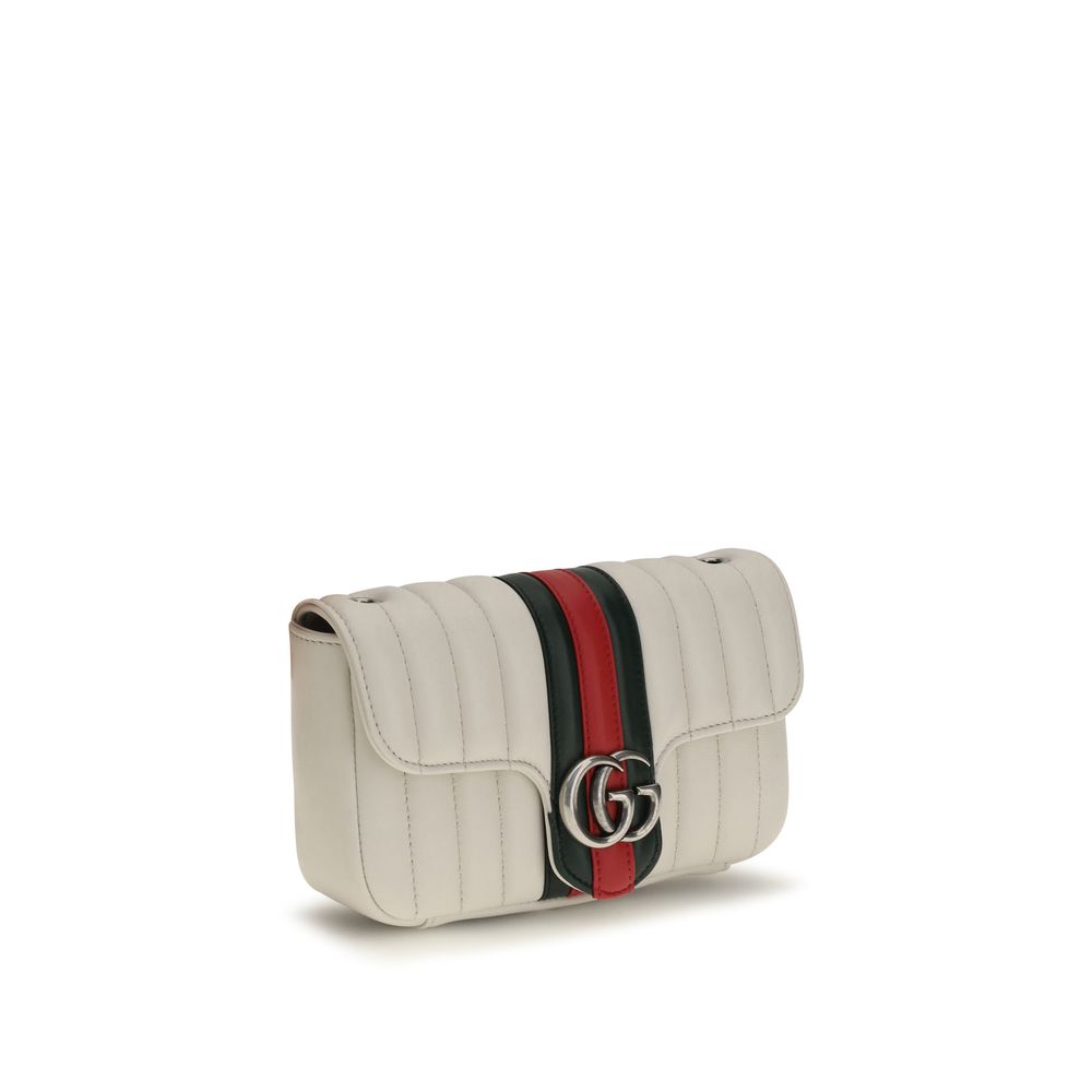 Small Shoulder Bag by Gucci for women in nappa leather green, palladium, red, white & striped features a effortless chic silhouette with a secure , ample , and versatile shoulder-strap & detachable-strap for a effortless chic finish.