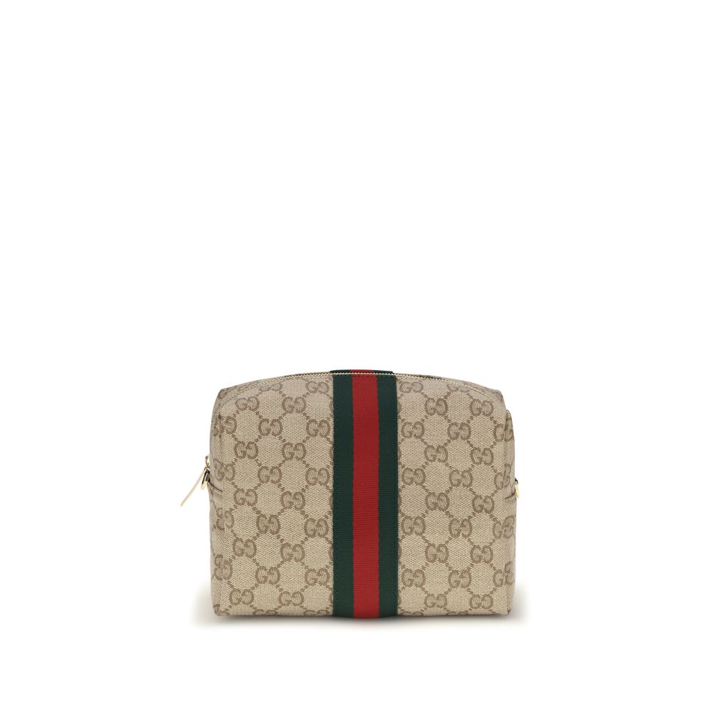 Mini Quilted Travel Camera Crossbody Shoulder Bag by Gucci for women in leather & canvas beige, gold, signature & striped features an effortlessly chic silhouette with a secure zipper, ample , and versatile crossbody-strap & shoulder-strap for effortlessly chic everyday luxury.