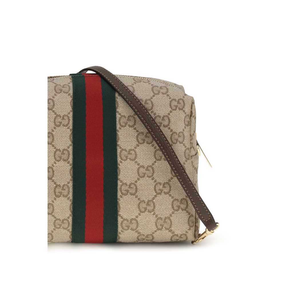 Mini Quilted Travel Camera Crossbody Shoulder Bag by Gucci for women in leather & canvas beige, gold, signature & striped features a distinguished silhouette, showcasing a secure zipper and distinguished with versatile crossbody-strap & shoulder-strap for a distinguished finish.