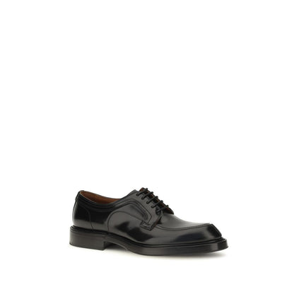 Derby Loafer Shoes by Dolce & Gabbana for men in tu textile & bos taurus calfskin leather black features an ergonomic silhouette, perfectly showcasing Men's TU Textile & Bos Taurus Calfskin Leather Derby Loafer Shoes with its distinct and elegant .