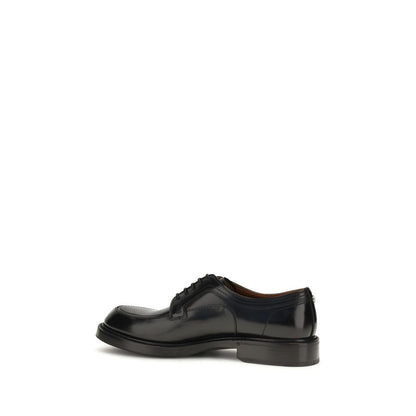 Derby Loafer Shoes by Dolce & Gabbana for men in tu textile & bos taurus calfskin leather black showcases a resplendent Men's TU Textile & Bos Taurus Calfskin Leather Derby Loafer Shoes aesthetic, defined by its resplendent and elegant .