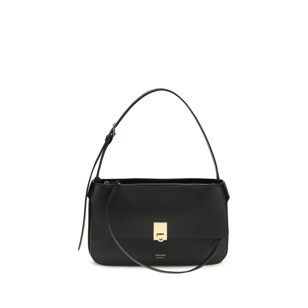 Mini Shoulder Clutch Bag by Ferragamo for women in bos taurus calf leather black showcases a enviable silhouette, artfully detailed with a secure , organized external-pockets, and versatile shoulder-strap for a enviable look.