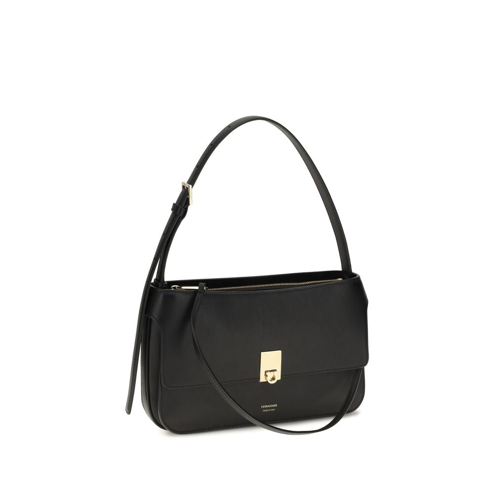 Mini Shoulder Clutch Bag by Ferragamo for women in bos taurus calf leather black features a distinguished silhouette, showcasing a secure and distinguished external-pockets with versatile shoulder-strap for a distinguished finish.