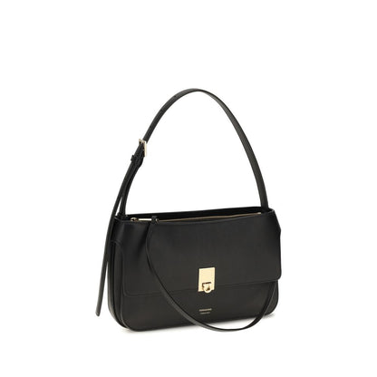 Mini Shoulder Clutch Bag by Ferragamo for women in bos taurus calf leather black features a distinguished silhouette, showcasing a secure and distinguished external-pockets with versatile shoulder-strap for a distinguished finish.
