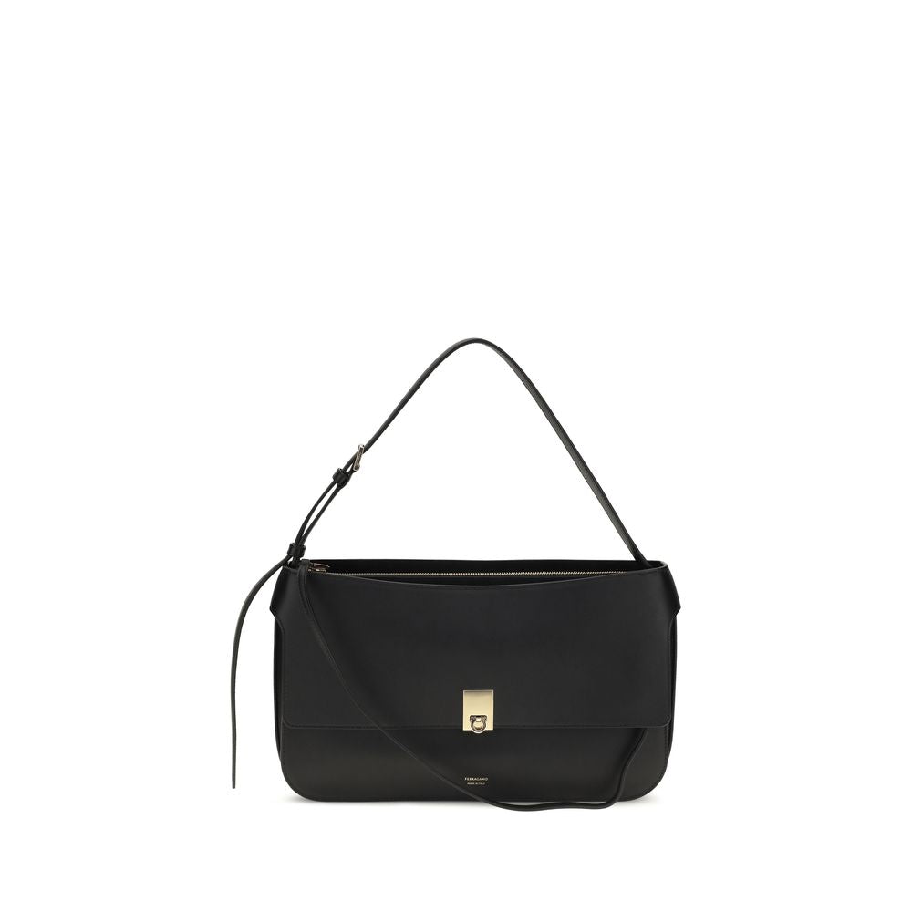 Small Shoulder Clutch Bag by Ferragamo for women in bos taurus calf leather black showcases a enviable silhouette, artfully detailed with a secure buckle, organized external-pockets, and versatile shoulder-strap for a enviable look.