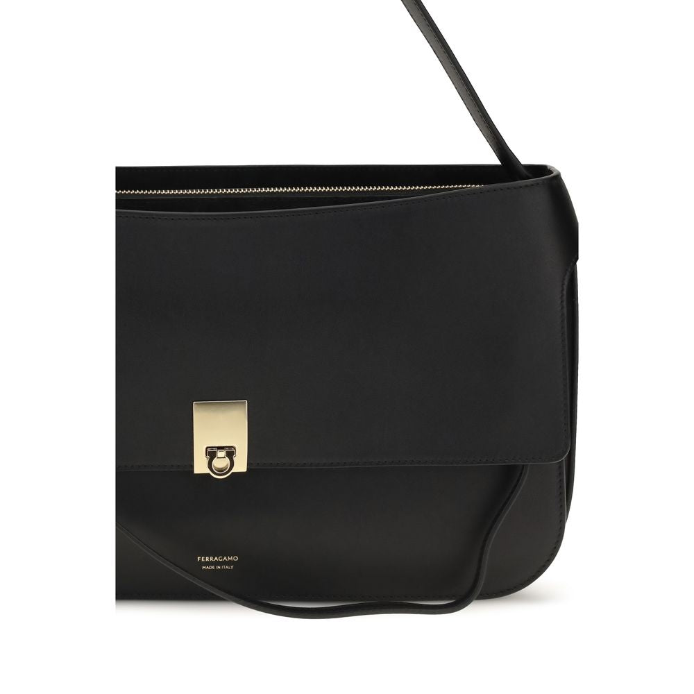 Small Shoulder Clutch Bag by Ferragamo for women in bos taurus calf leather black features a effortless sophistication silhouette, secured by a buckle with ample external-pockets and versatile shoulder-strap for a effortless sophistication finish.