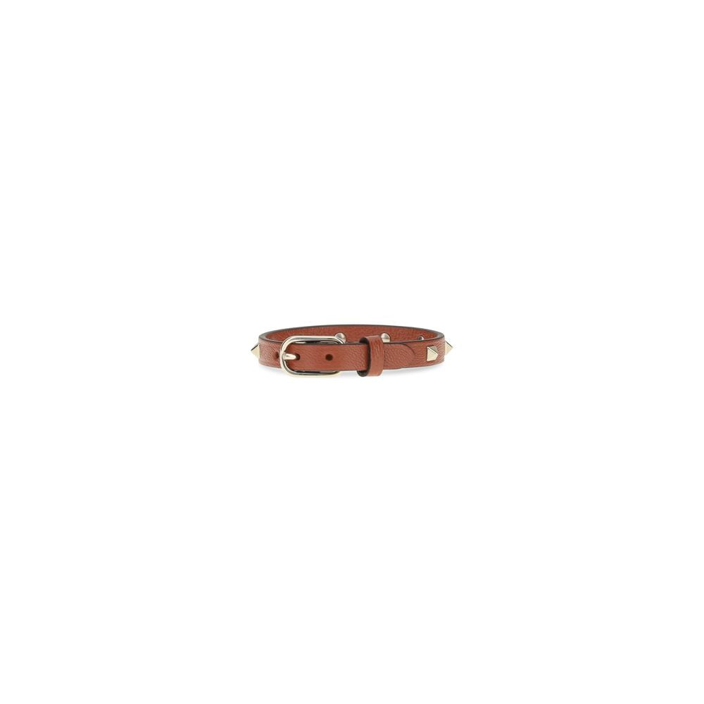 Bracelet by Valentino Garavani for women in bos taurus calfskin leather brown & gold showcases a enchanting silhouette, artfully highlighting the and signature Rockstud Women's Bos Taurus Calfskin Leather Bracelet aesthetic in this enchanting piece.