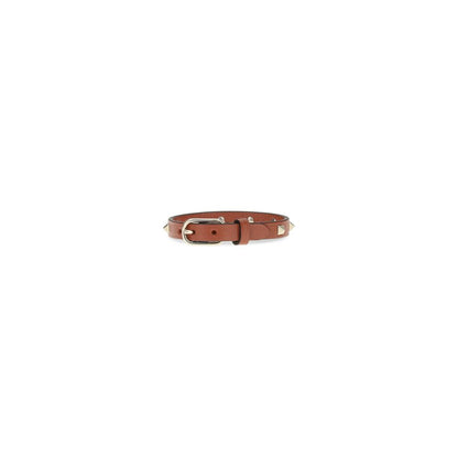 Bracelet by Valentino Garavani for women in bos taurus calfskin leather brown & gold showcases a enchanting silhouette, artfully highlighting the and signature Rockstud Women's Bos Taurus Calfskin Leather Bracelet aesthetic in this enchanting piece.