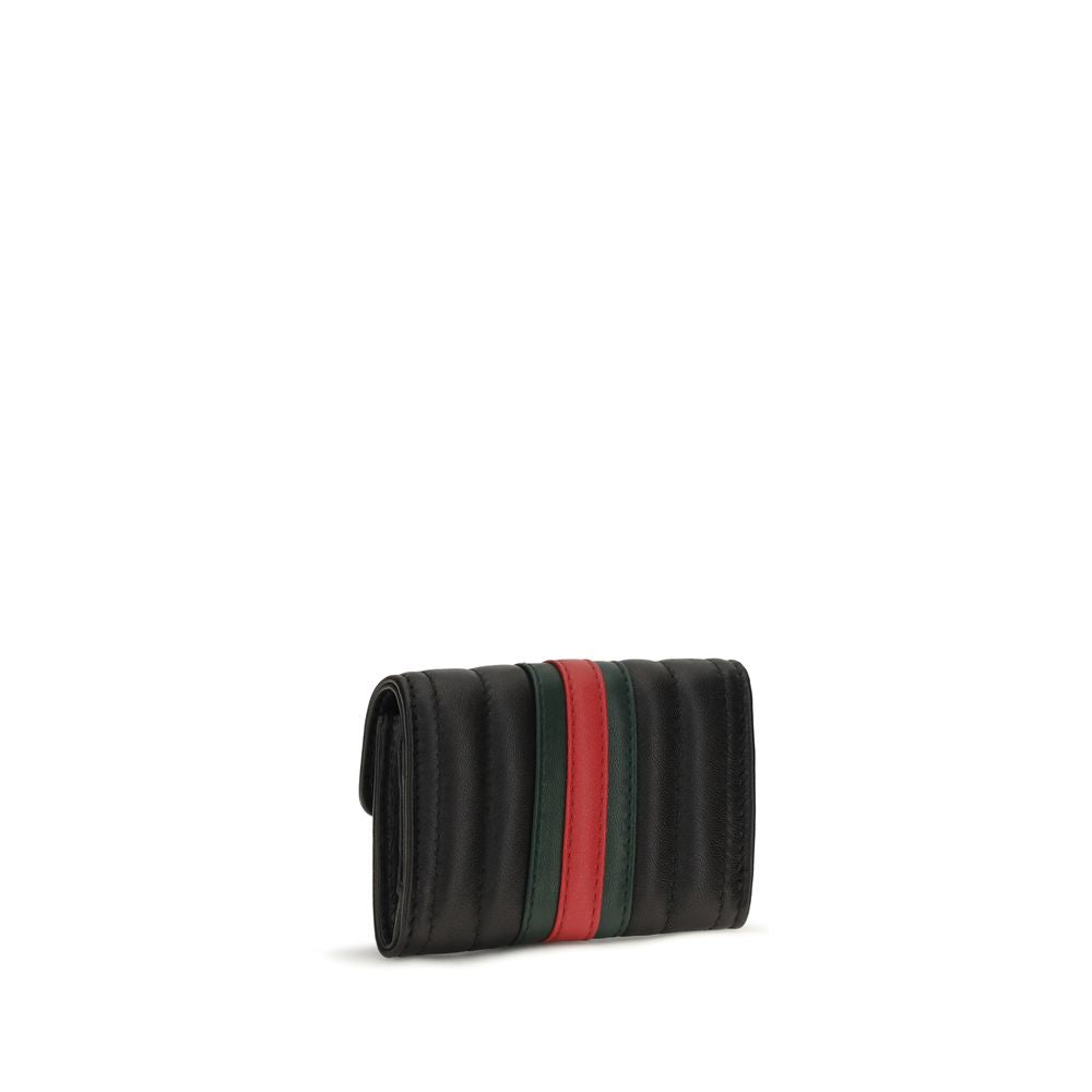 Wallet by Gucci for women in bos taurus calf leather black, gold & signature presents a architectural silhouette from the Gg Bos Taurus Calf Leather Wallet collection, showcasing architectural for a architectural finish.