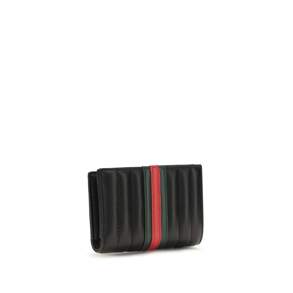 Wallet by Gucci for women in bos taurus calf leather black, signature & striped features a sleek silhouette, showcasing the sleek Gg Marmont Bos Taurus Calf Leather Wallet design with sophisticated compact-design for a premium look.